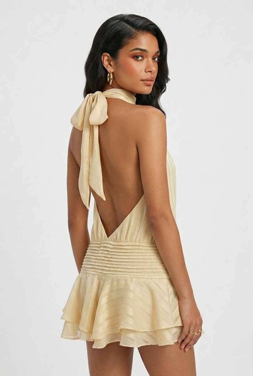 Women’s light yellow mini dress, open back with bow tie and tiered ruffle hem