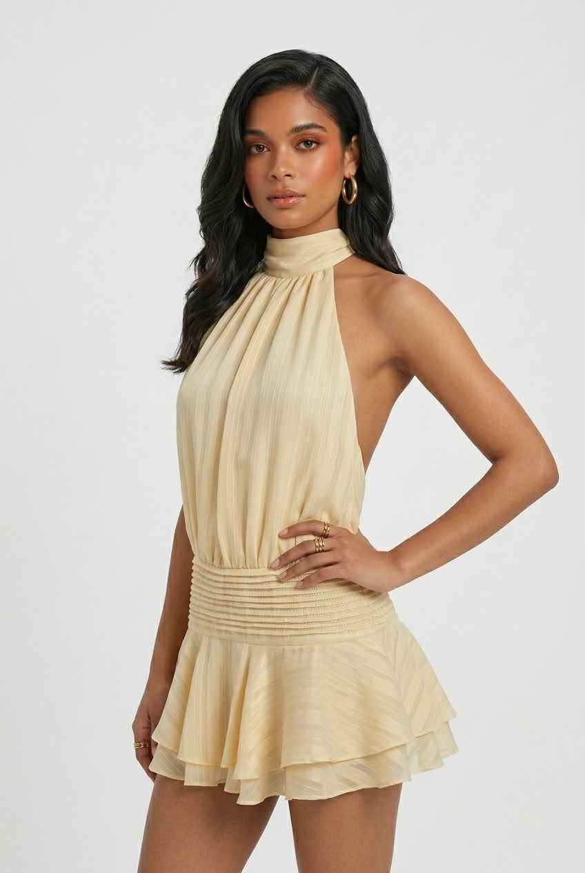 Women’s light yellow halter mini dress with high neck and tiered ruffle hem