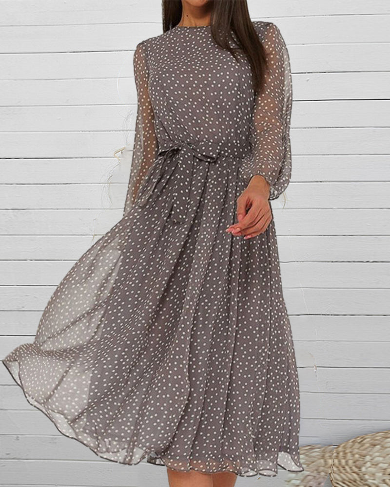 Grey polka dot A-line dress with long sheer sleeves, high neck, gathered waist bow