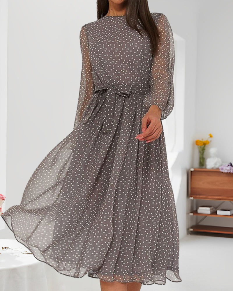 Grey polka dot knee-length A-line dress with long sheer sleeves and waist bow tie