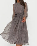 Grey polka dot A-line dress, long sheer sleeves, high neckline, bow at waist, pleated skirt