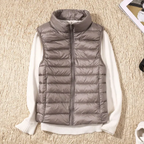 Ultralight quilted bodywarmer in gray, sleeveless, full-zip with stand collar