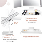 White LED makeup mirror with pivoting light bar and built-in brush stand base
