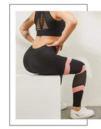 Women's high-waisted yoga leggings, black with pink knee stripe and textured mesh lower legs