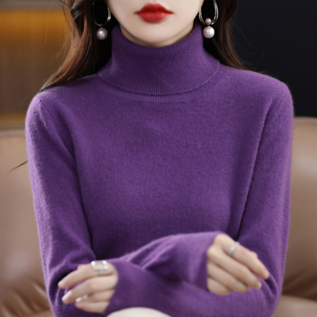 Women's cashmere turtleneck sweater in purple, long sleeves, ribbed collar and cuffs.