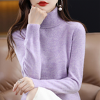 Women's cashmere turtleneck sweater in mauve, long sleeves, ribbed collar and cuffs.