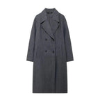 Women's winter coat in charcoal gray with notched lapels and double-breasted closure