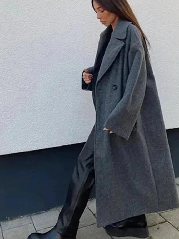 Women's oversized winter coat in medium gray with wide lapels and button front