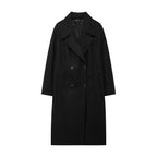 Women's winter coat in black with wide notched lapels and double-breasted buttons