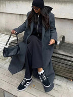 Women's oversized winter coat in dark gray, double-breasted style, notched lapels