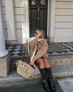 Women's loose-fit light brown coat with large lapels and button front