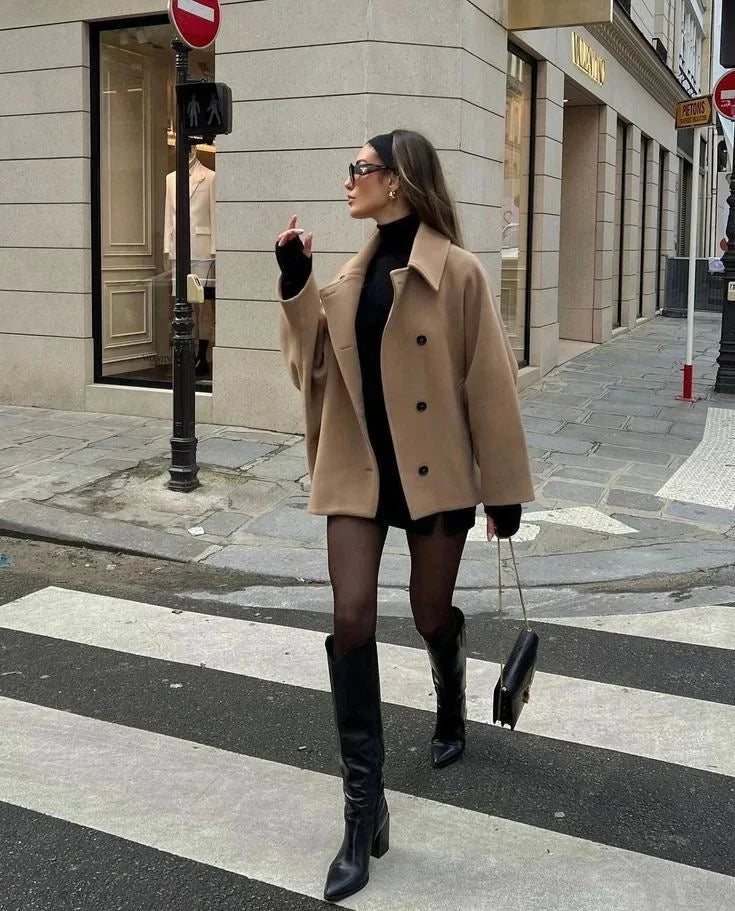 Light brown loose-fit women’s coat with large lapels and button front, street view.