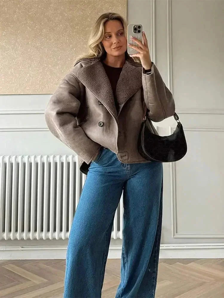 Women’s mauve teddy-collar coat with button front and plush collar detail