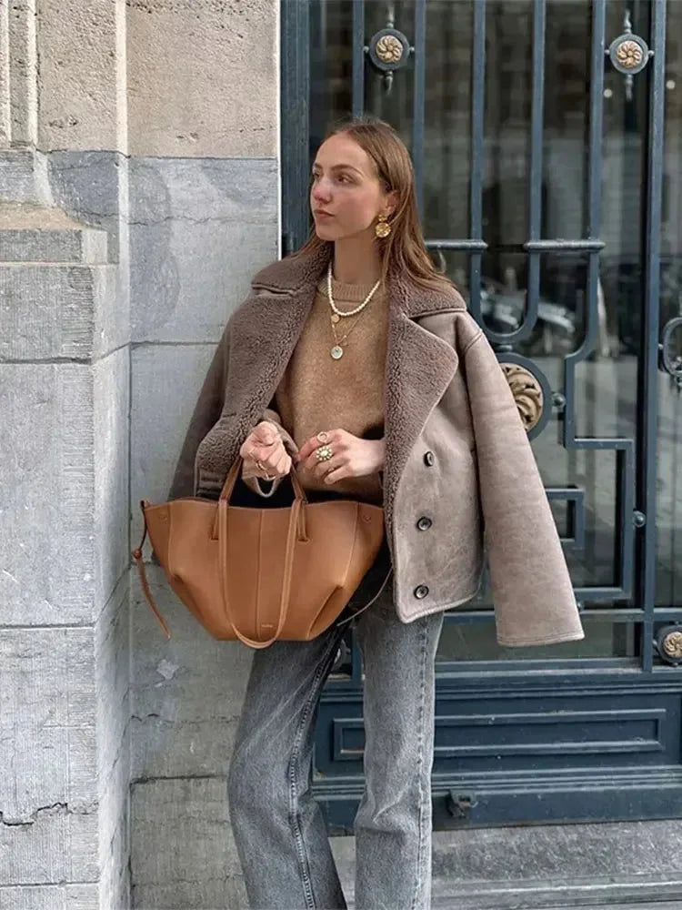 Women’s mauve teddy-collar coat with button front and relaxed fit shoulder seams