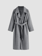 Long women's coat with belt tie and wide notched collar, dark gray