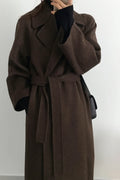 Long women's belted coat with notched lapel collar, dark brown, side view