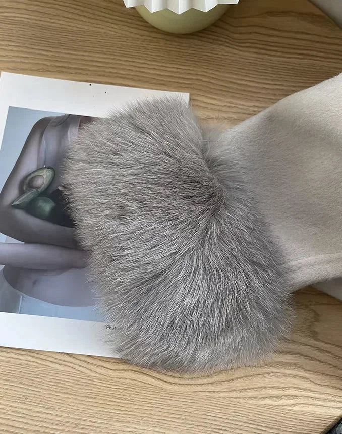 Long coat sleeve cuff with thick faux fur trim, light gray