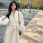 Long belted women’s coat with faux fur cuffs, off-white wrap V-neck