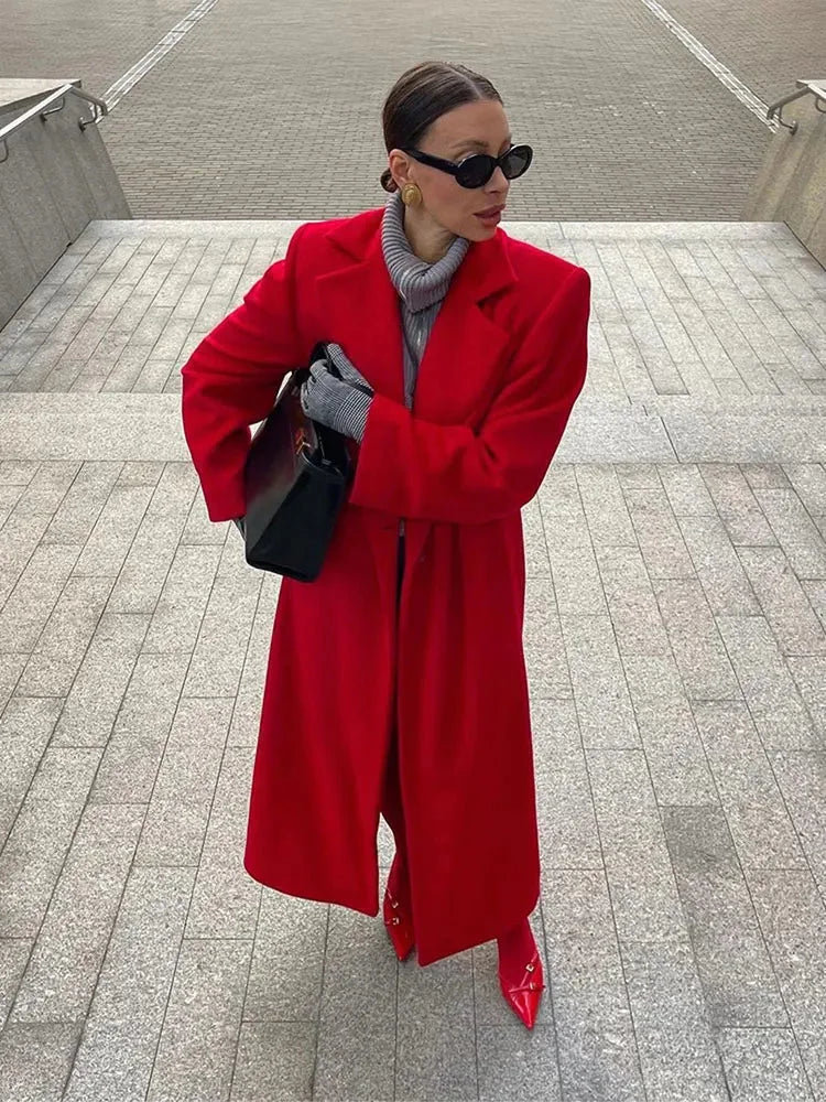 Long women's red coat with voluminous sleeves and notched lapels