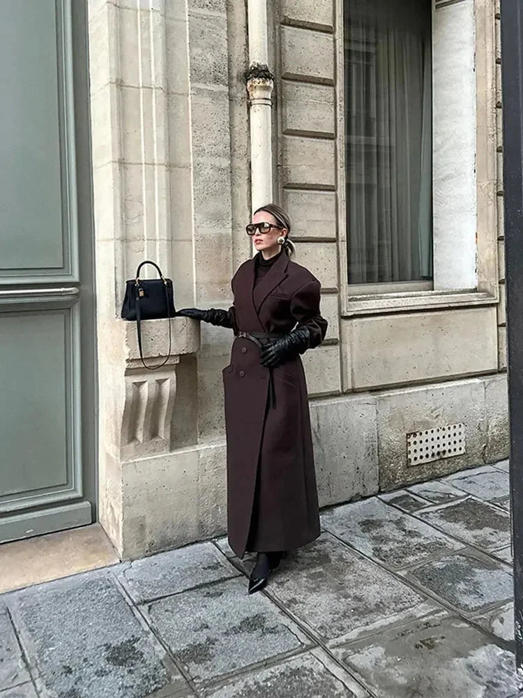 Long women's dark brown coat with belted waist and button front