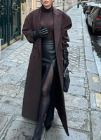 Long women's dark brown oversized coat with button front and belt