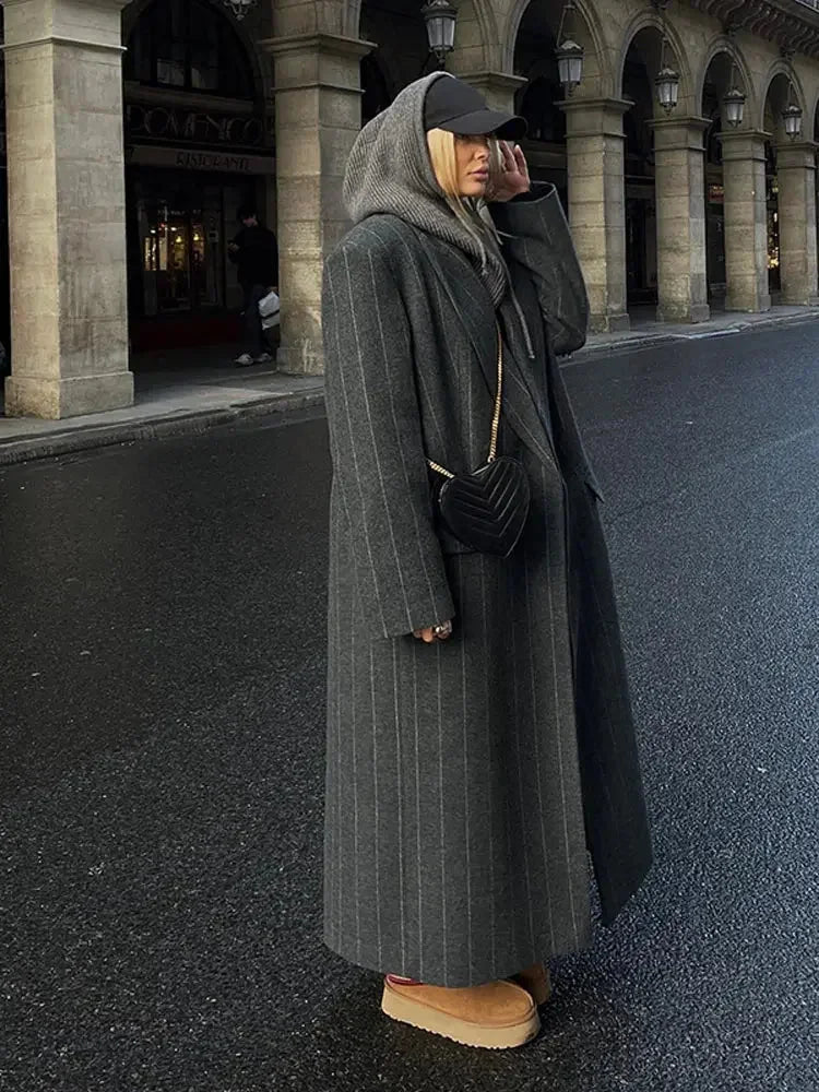 Long hooded dark gray pinstripe coat with front buttons and side pockets