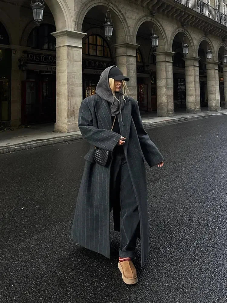 Long hooded dark gray pinstripe coat with double-breasted buttons and side pockets