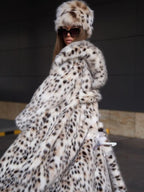 Long leopard-print faux fur hooded coat with open front and wide sleeves