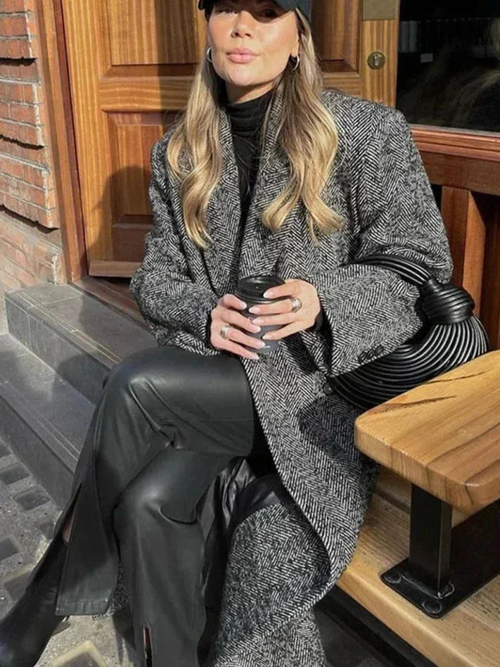 Women’s long gray textured coat with long sleeves and open front