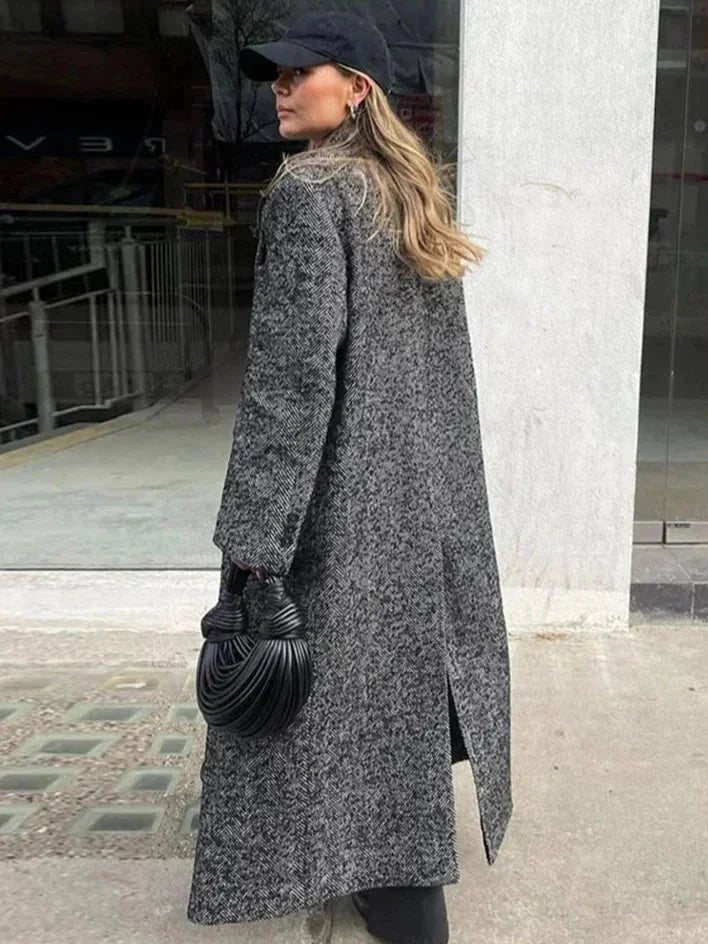 Women’s long gray textured coat with long sleeves and side slit opening