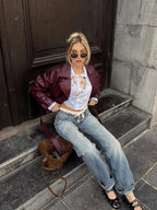 Burgundy short trench coat with belt tie, structured collar and long sleeves