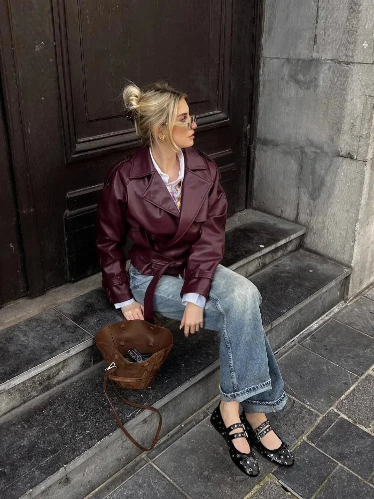 Burgundy belted short trench coat with notched lapels and long sleeves