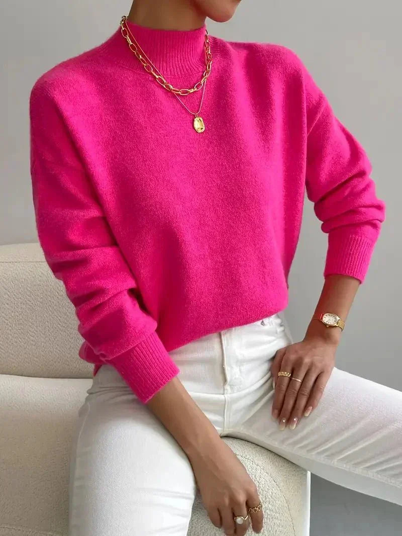Pink women’s crew-neck sweater with ribbed cuffs and hem