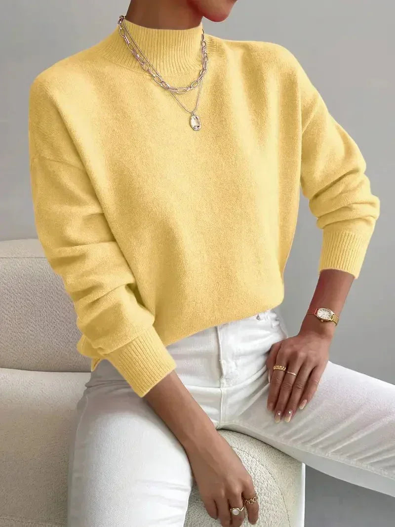 Yellow women’s crew-neck sweater with ribbed cuffs and hem