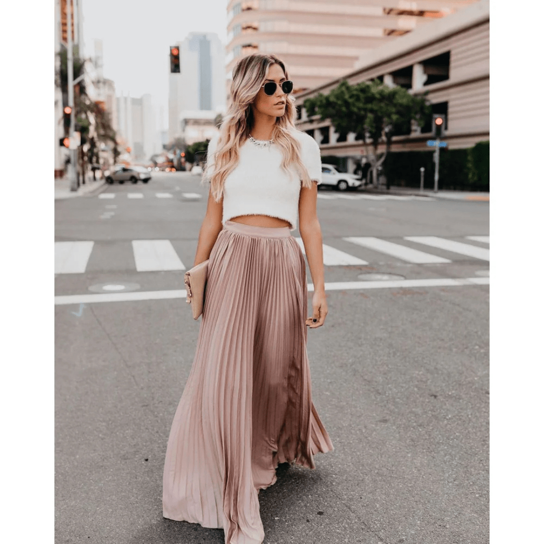 Dusty pink pleated maxi skirt with elastic waistband and flowing A-line drape
