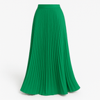 Green pleated maxi skirt with elastic waistband and flowing A-line silhouette