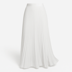 White pleated maxi skirt with elastic waistband and flowing A-line silhouette