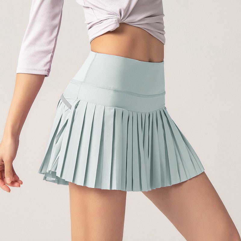 Light blue tennis skirt with pleated A-line hem and elastic waistband