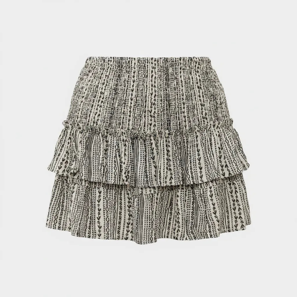 Black-and-white patterned tiered mini skirt with elastic waistband