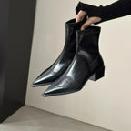 Black pointed-toe ankle boots with tapered shaft and square block heel