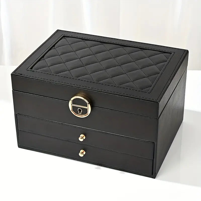 Black multilayer leather jewelry box with quilted top, gold lock, and two drawers