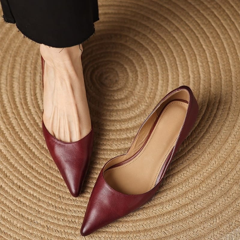 Maroon pointed-toe kitten heels with low block heel and smooth leather-look upper