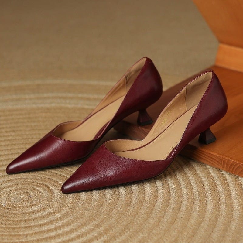 Maroon pointed-toe kitten heels with low block heel and smooth leather-look uppers