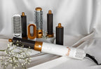 Hair dryer brush styler kit with white handle, gold barrels, and multiple styling attachments