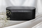 Black zip-up storage case for hair dryer brush attachments