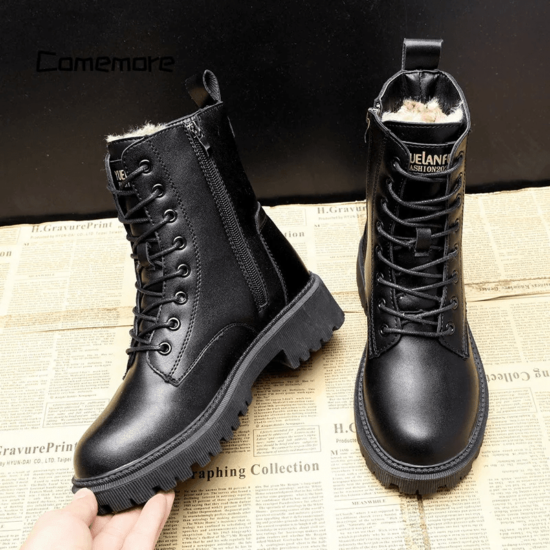 Black lace-up winter ankle boots with side elastic panel and chunky tread sole
