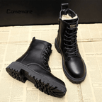Black lace-up winter ankle boots with rounded toe and chunky tread sole