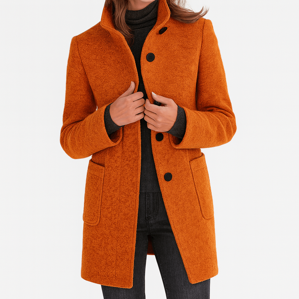 Women’s straight-cut button-front coat in burnt orange with notch collar and patch pockets.