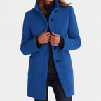 Women’s straight-cut button-front coat in bright blue with notch collar and patch pockets.