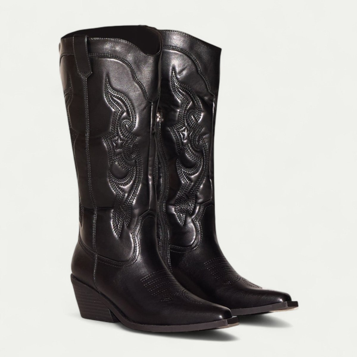 Women's black leather western boots with detailed stitched design and low stacked heel